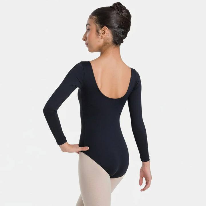 Person wearing a black long-sleeve leotard on a white background
