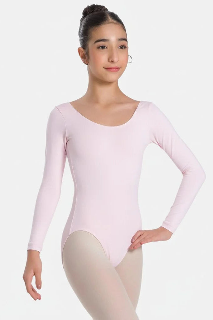 Person wearing a pink long-sleeve leotard on a white background