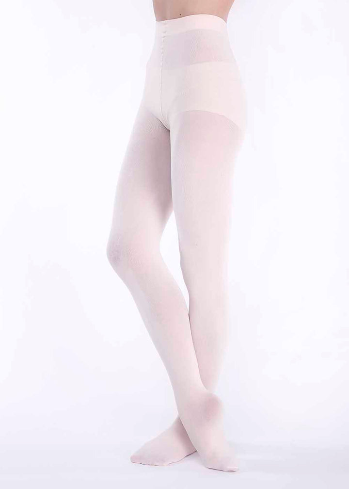 A pair of beige footed tights for girls, made from a nylon and spandex blend, displayed on a model.